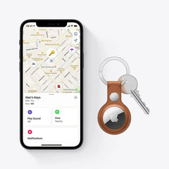 Apple AirTag attached to a keychain, ideal for tracking everyday items