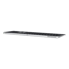 Side view of Magic Keyboard in black, showcasing its thin profile