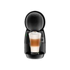 Front view of the NESCAFÉ® Dolce Gusto® Piccolo XS coffee machine with cooffee mug on it