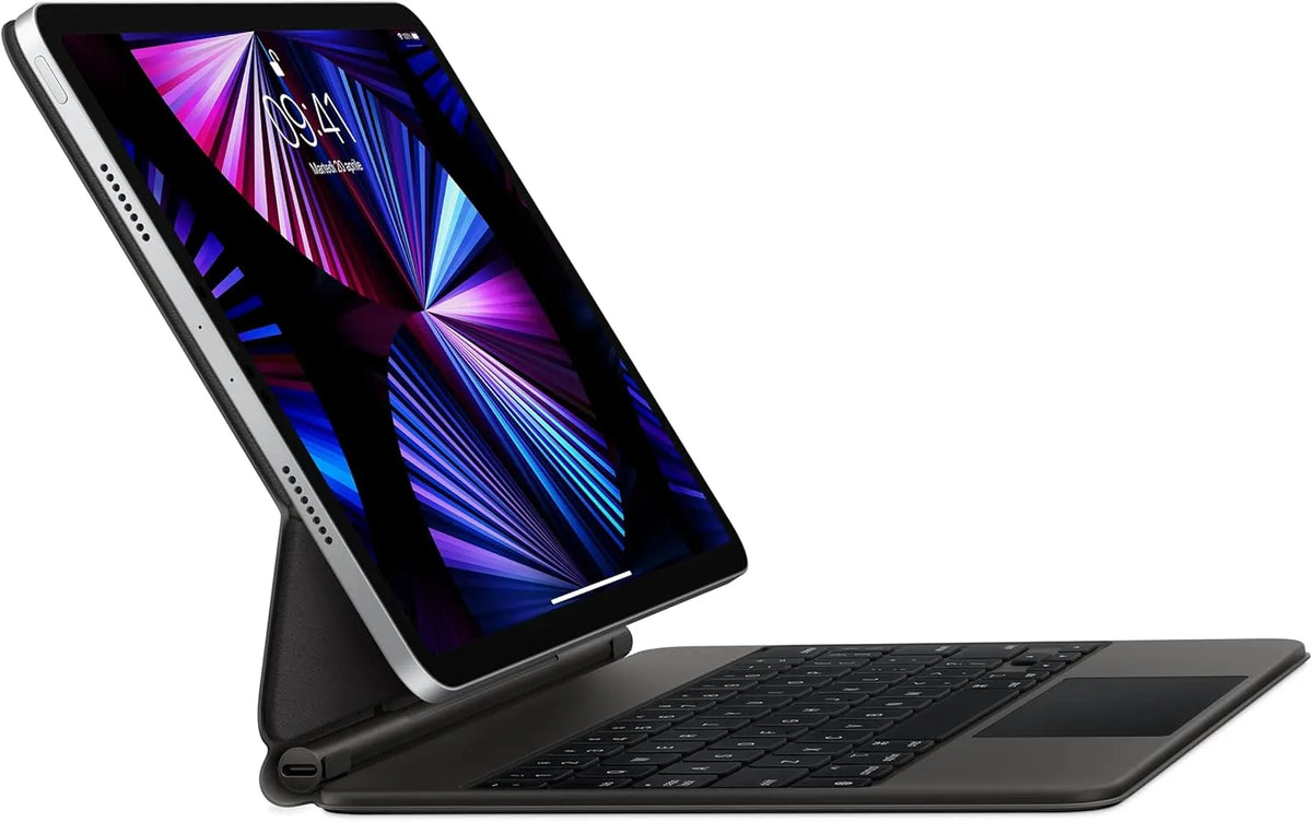 Front view of Apple Magic Keyboard in black attached to iPad Pro 11-inch in floating position.
