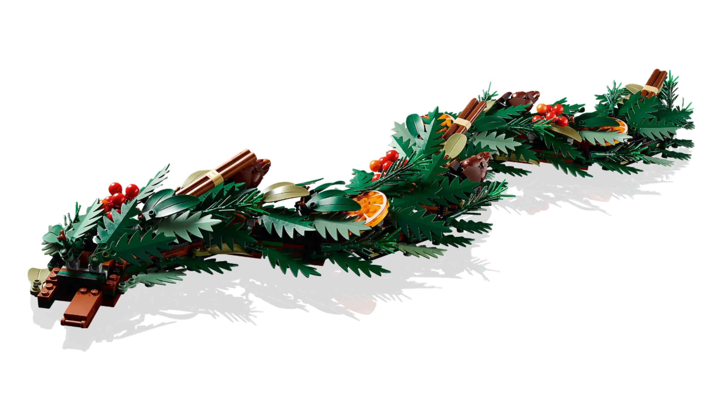 Close-Up of LEGO Holiday Wreath with Red Berries and Greenery

