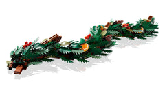 Close-Up of LEGO Holiday Wreath with Red Berries and Greenery

