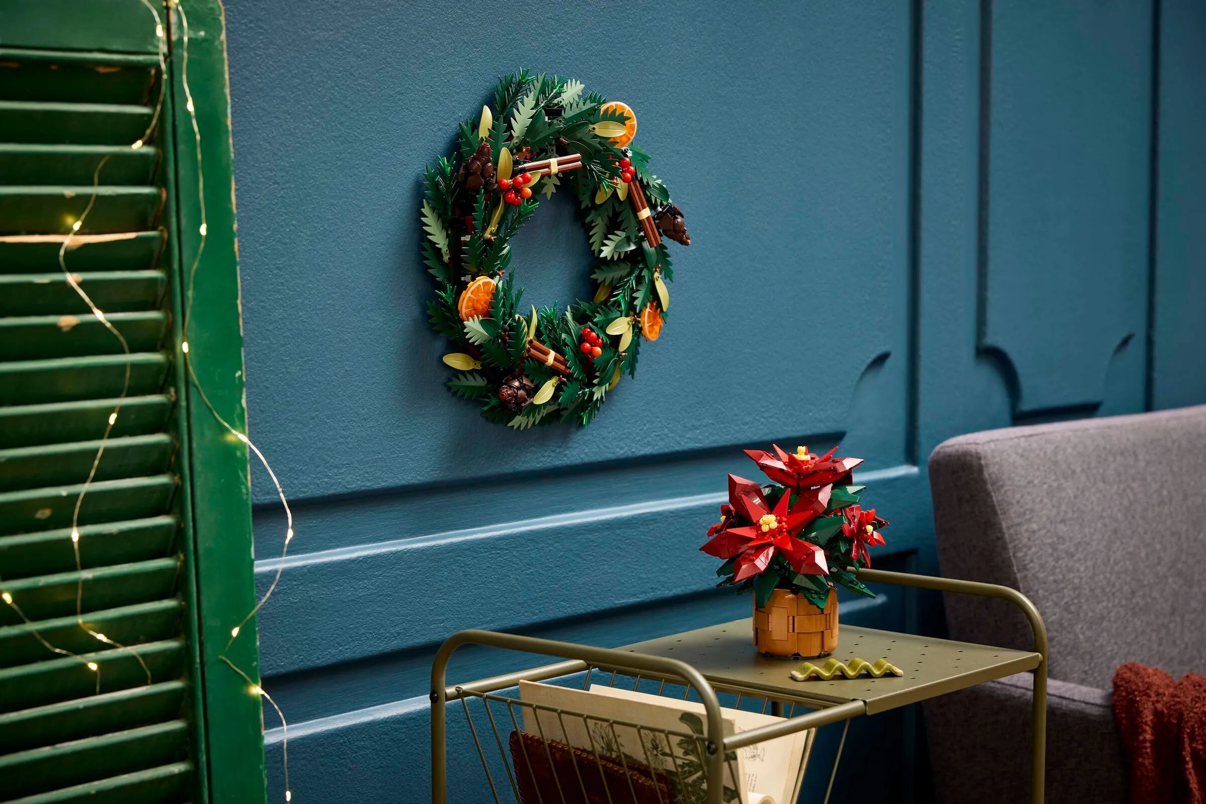 Christmas Scene Featuring LEGO Icons Wreath Hanging on Wall


