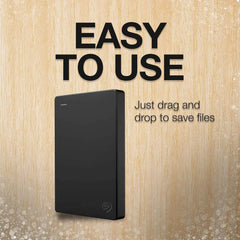 Seagate Portable Drive plugged into a laptop, highlighting plug-and-play simplicity