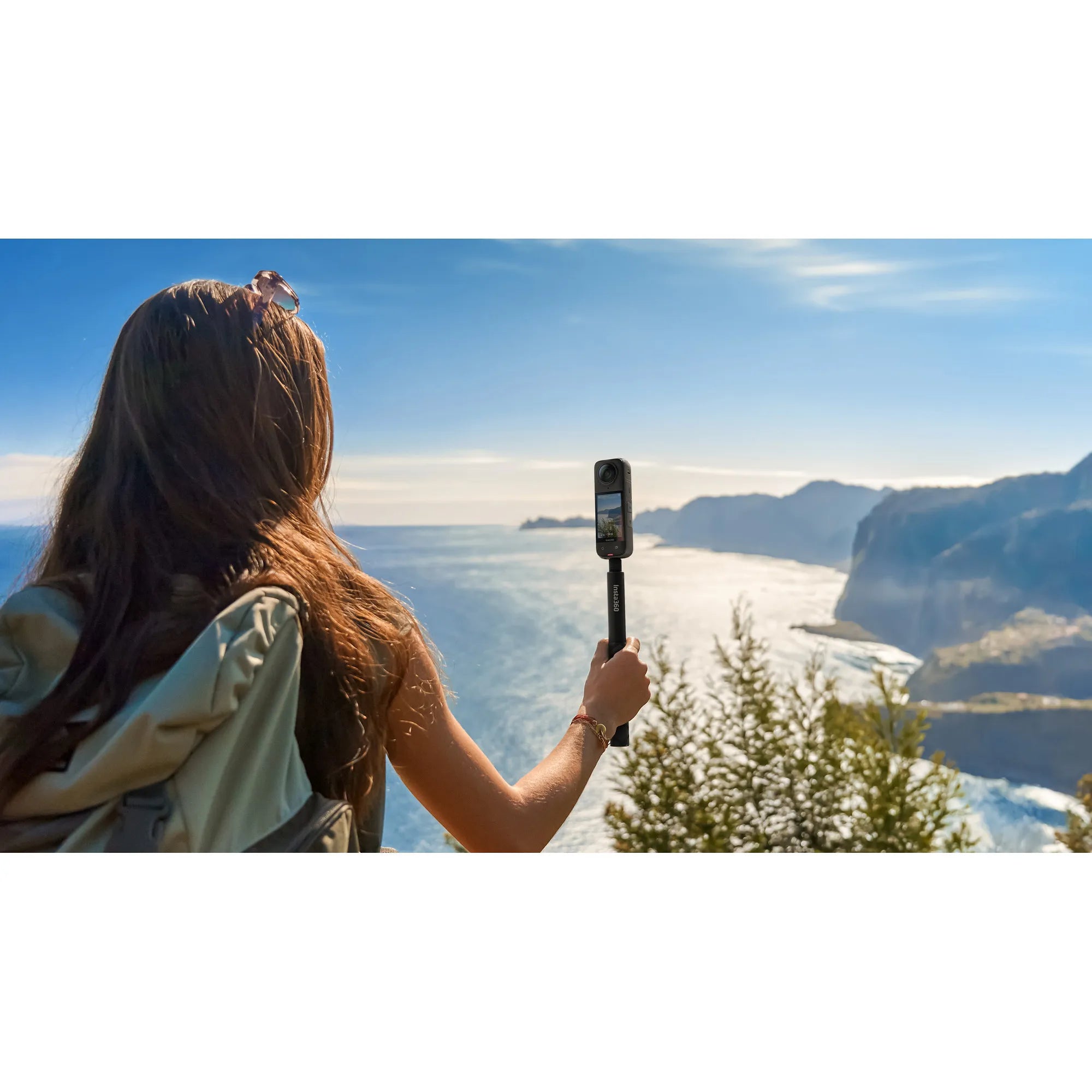 User recording with Insta360 X4 while hiking

